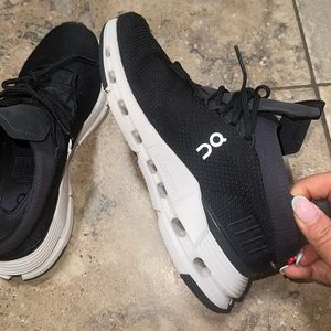ON black and white women’s sneaker